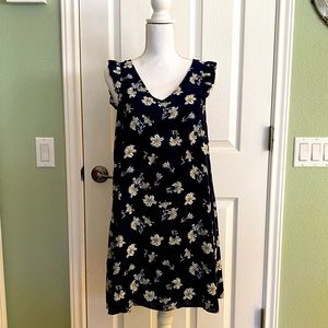 Floral sleeveless dress. Worn to a Jay-Z concert.